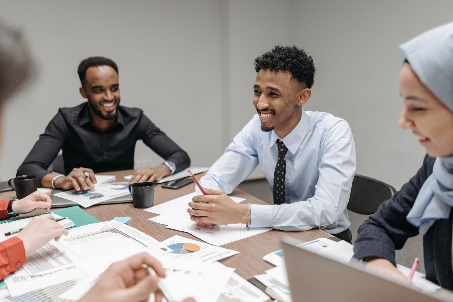 A team at a table in a modern office